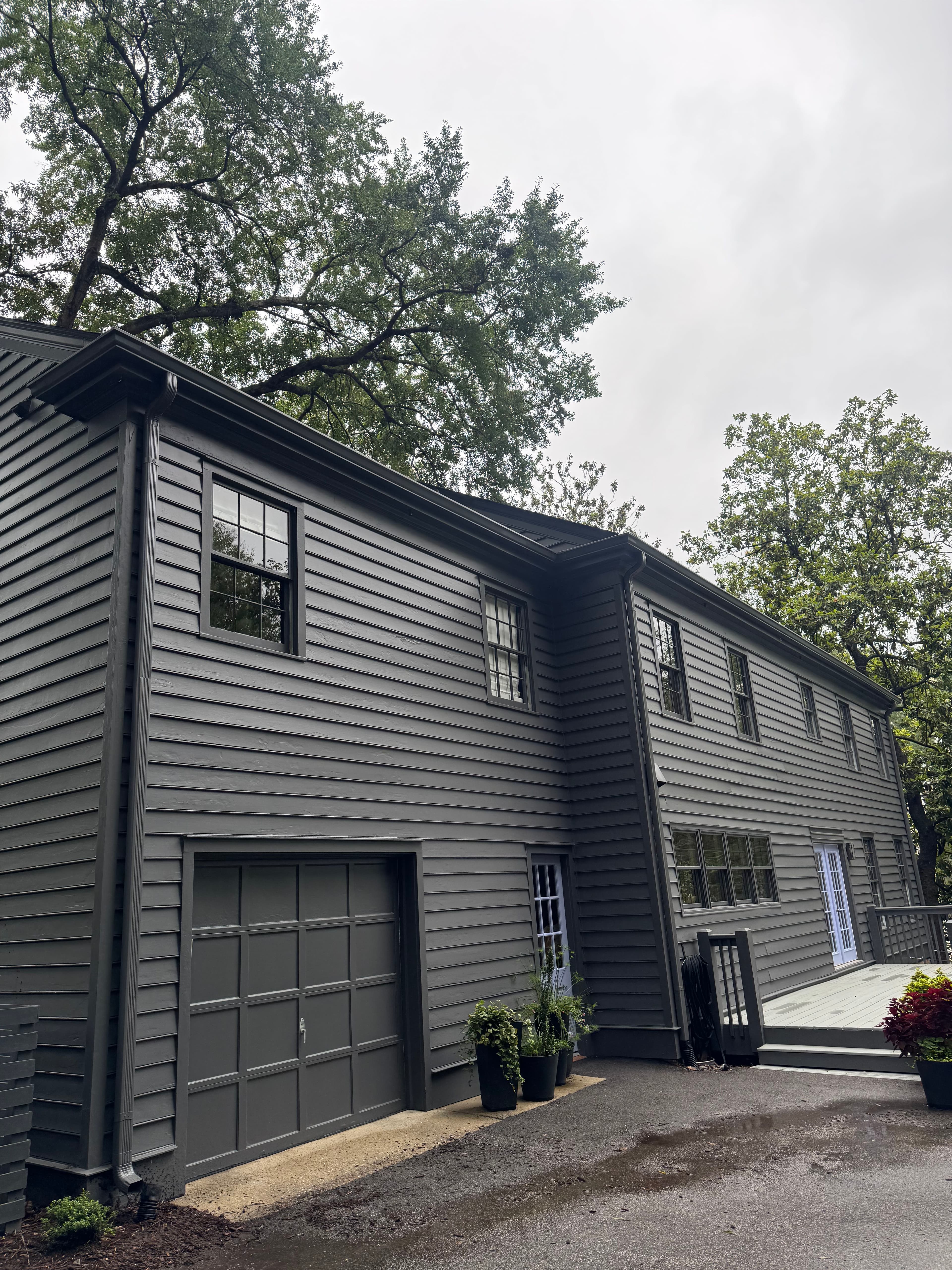 Project Tuxedo Gray Gutter Installation on a Sharp Two-Story Home image