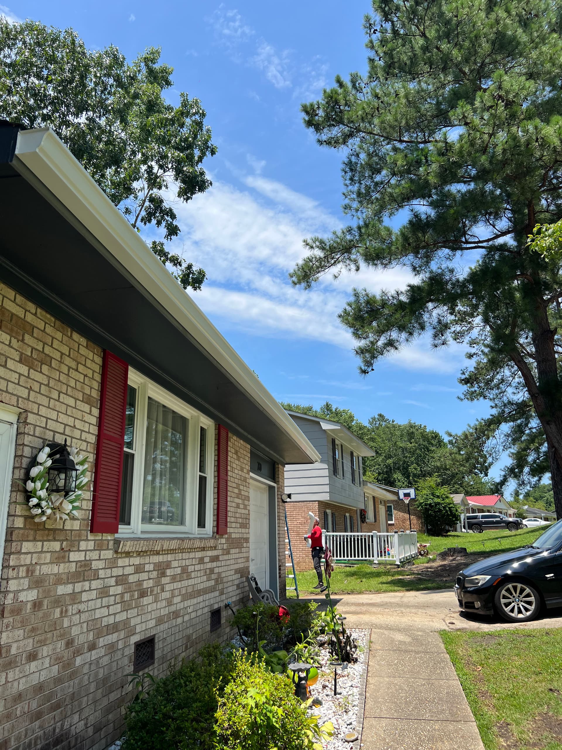New 6-Inch Gutters and Fresh Siding on a Brick Home image
