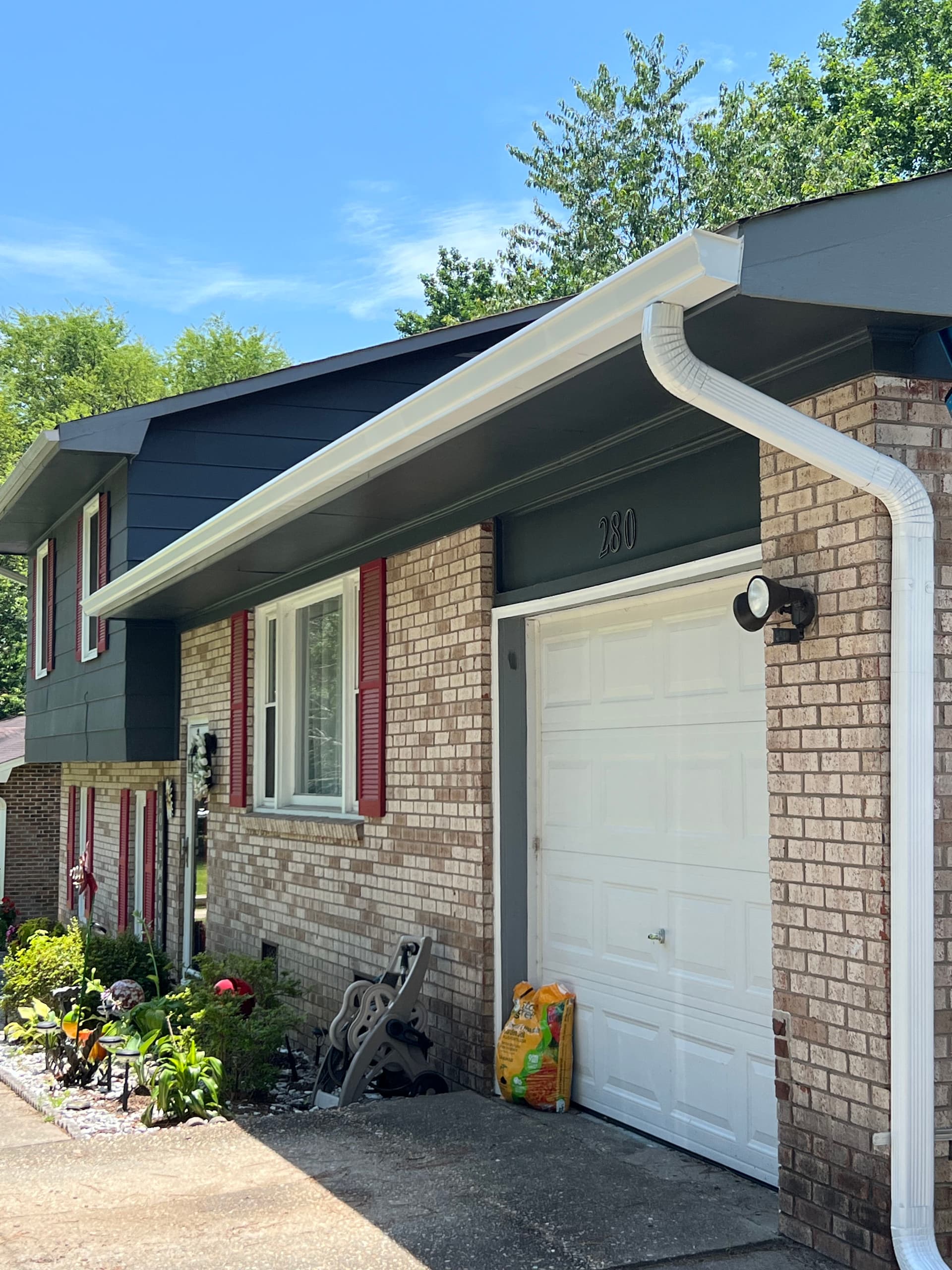 Gallery photos for New 6-Inch Gutters and Fresh Siding on a Brick Home: Image #1